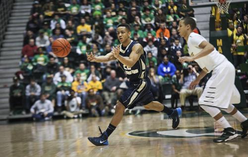 Sophomore Joe McDonald passes the ball during GW's game against George Mason on Jan. 25. Hatchet File Photo