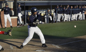 Junior Xavier Parkmond hits an RBI single Thursday against Delaware State to extend GW's lead to 5-3 in the sixth inning. Josh Solomon | Hatchet Staff Photographer 