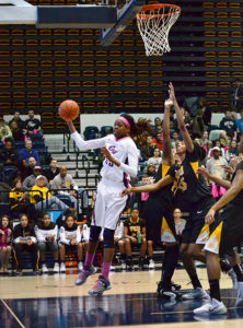 Star forward Jonquel Jones charges to the basket during a game last season. Hatchet File Photo