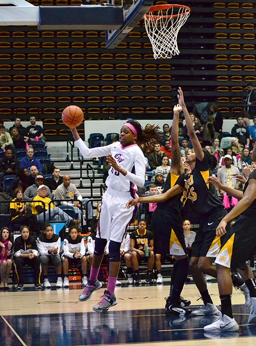 Sophomore forward Jonquel Jones charges to the basket Saturday night against the VCU Rams. Aly Kruse | Hatchet Staff Photographer