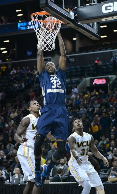Senior Isaiah Armwood slams home a dunk Saturday for two of his team-high 15 points. | Samuel Klein | Photo Editor