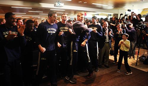 GW players and fans celebrate as GW is given a No. 9 seed in the NCAA Tournament's East region. Cameron Lancaster | Assistant Photo Editor 