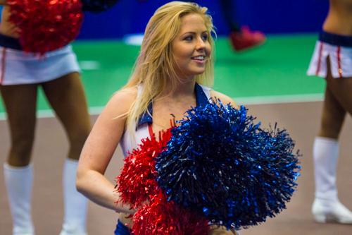 A Kastles cheerleader performs in the pre-match announcements. Zach Montellaro | Hatchet Staff Photographer