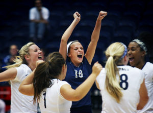 Junior Maddie Doyle celebrates with her team after scoring against Georgetown on Tuesday night in the Smith Center. The Colonials blanked the Hoyas 3-0 to register a 7-3 record in all competitions. Cameron Lancaster | Photo Editor