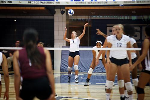 Junior setter Jordan Timmer serves against the Metropolitan University of Puerto Rico. Cameron Lancaster | Photo Editor