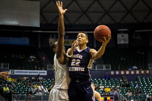 Joe McDonald drives to the basket during GW's 60-54 win over No. 11 Wichita State. McDonald scored 9 points and had 5 assists in the Colonials' Diamond Head Classic championship victory. Nora Princiotti | Hatchet Staff Photographer