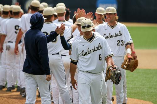 The Colonials celebrate their 2-1 win over Fordham on Sunday. GW dropped the first two games in the series. Zach Montellaro | Hatchet Staff Photographer