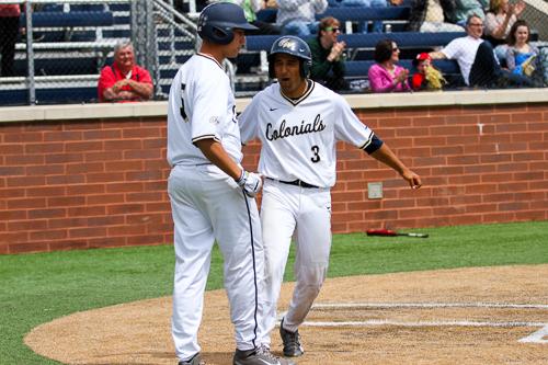 Sophomore Eli Kashi celebrates scoring the go-ahead run in the bottom on the eighth. GW won the third game in the series with Fordham. Zach Montellaro | Hatchet Staff Photographer