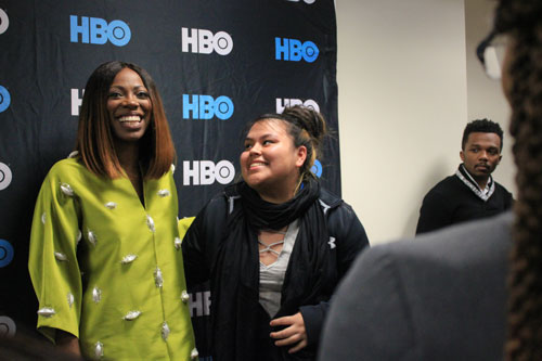 A fan meets Yvonne Orji, the one of the stars of HBO's Insecure, at a screening hosted by the Black Student Union. Anne McBride | Hatchet Staff Photographer