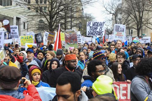 Protestors gathered near 12 and L Streets NW to speak out against the inauguration of President Donald Trump Friday. Max Wang| Hatchet Photographer